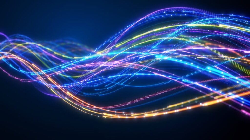 Digital illustration shows a number of glowing and colorful strands rippling against a dark background, suggesting an abstract representation of radio waves.
